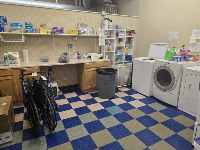 On-site laundry facility for cleaning donated items