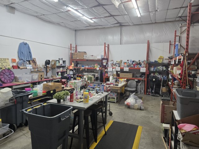 Inside the Mustard Seed thrift store sorting and processing area